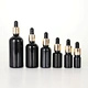 Various Volumes Black Essential Oil Glass Bottle with Golden Aluminum Dropper for Skincare